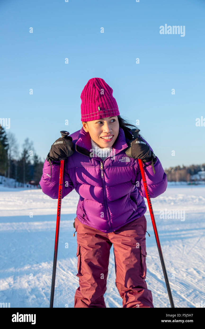 A woman learns to cross-country skiing Stock Photo
