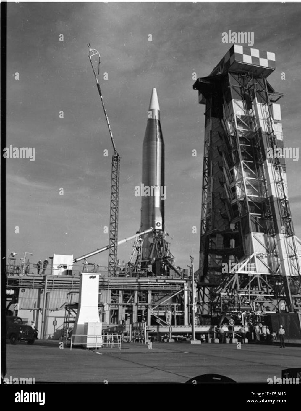 Photograph showing the Atlas rocket during a critical launch sequence ...