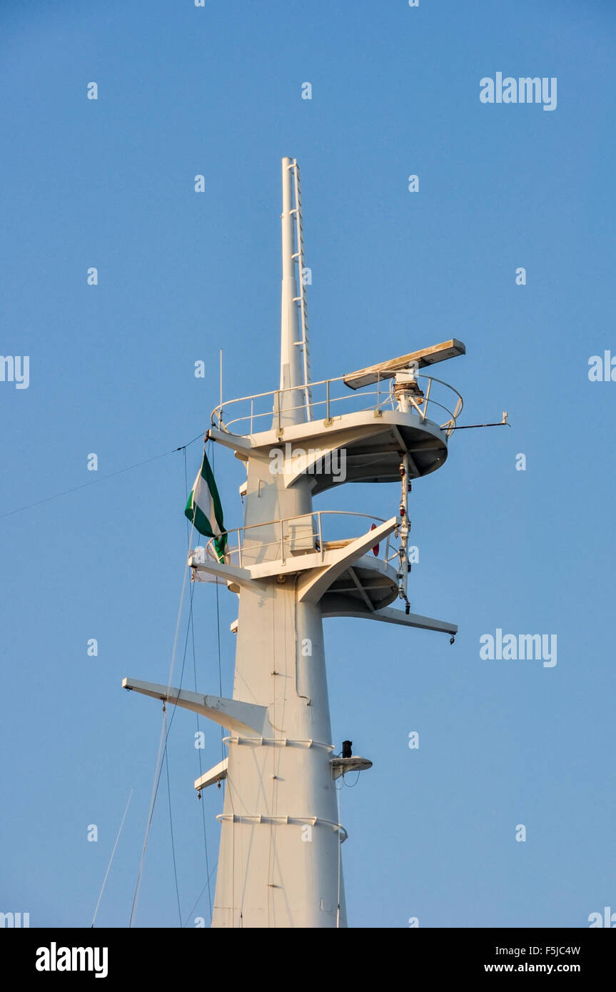 Mast with navigation, communication and safety equipment on ship Stock Photo