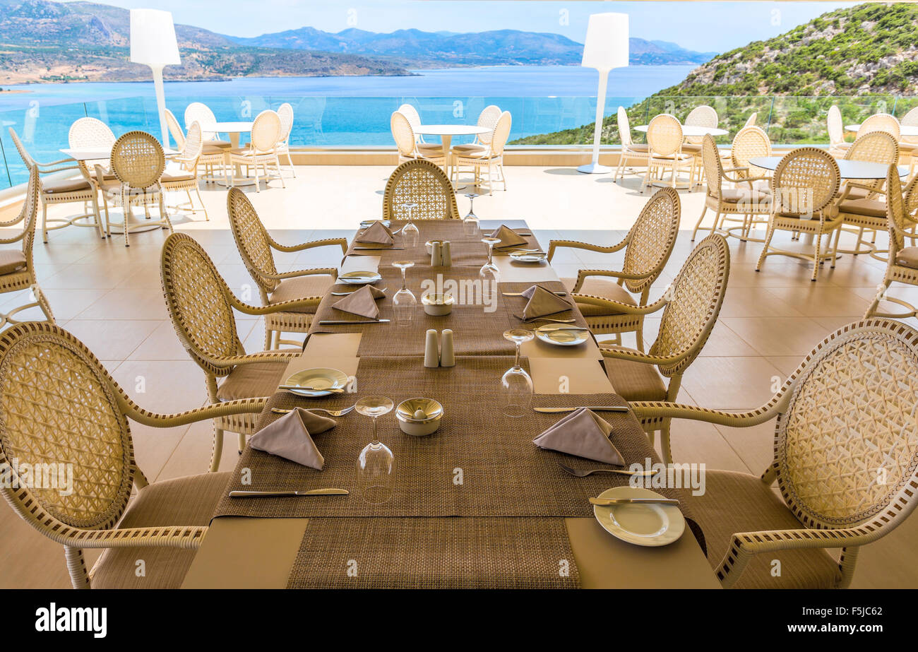 servered table in restaurant on the sea Stock Photo