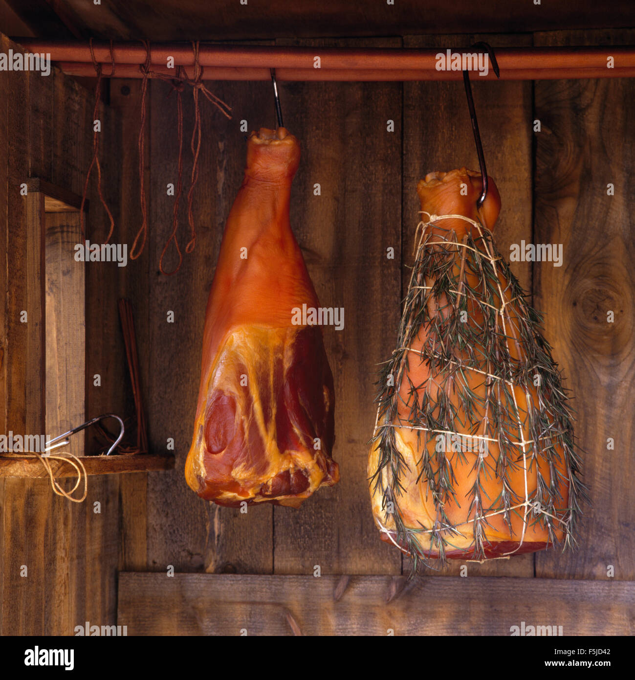 Closeup of Prosciutto ham hanging from ceiling Stock Photo Alamy