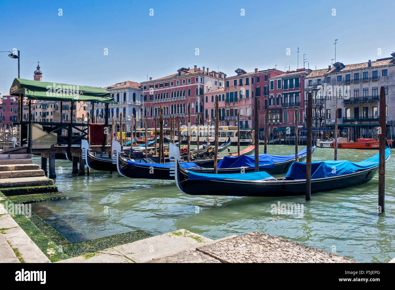 Gondolas Moored On The Grand Canal Venice Italy Stock Photo