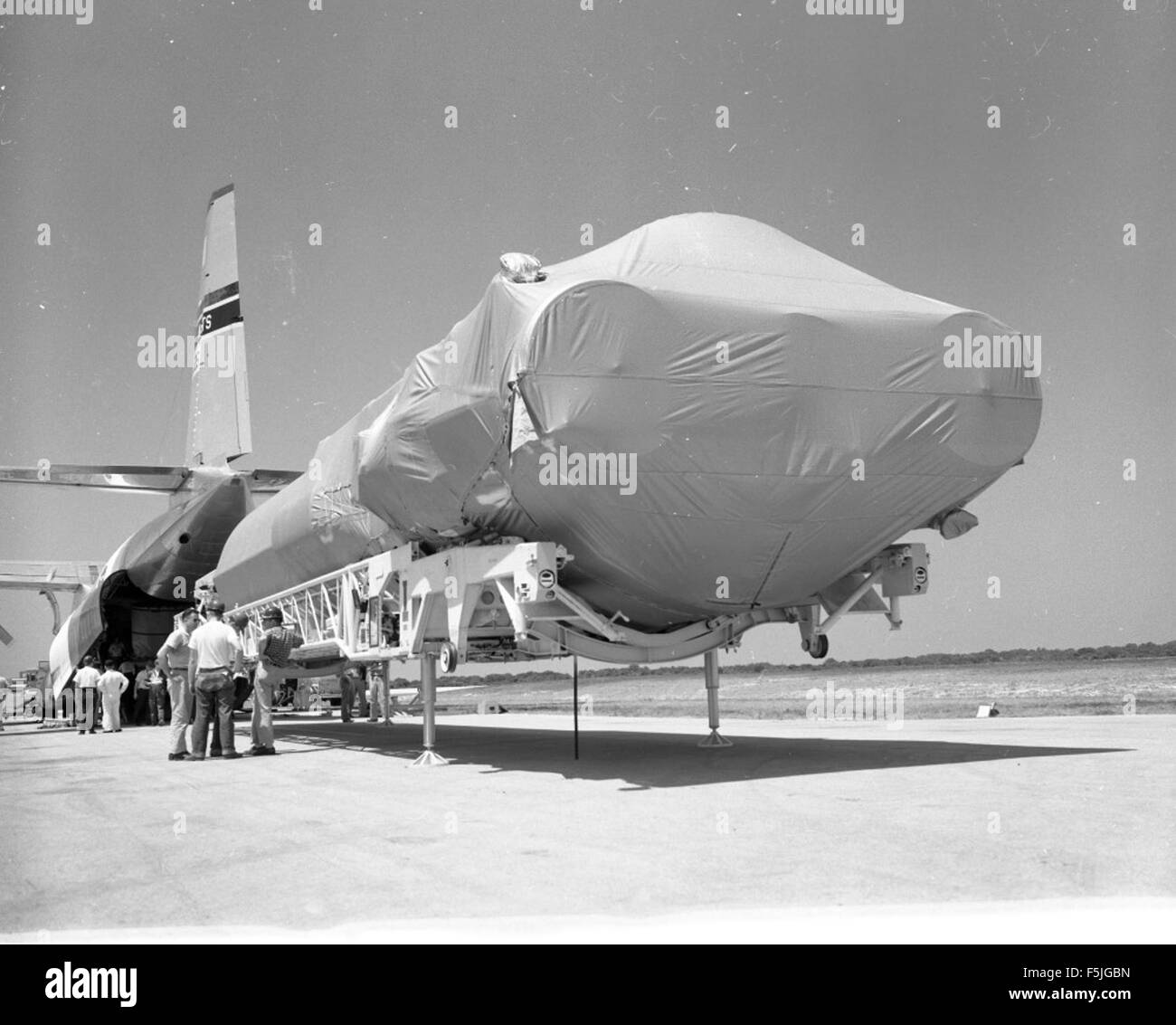 Atlas 3E Details 3E Arriving Via C-133 Plane Date Stock Photo - Alamy