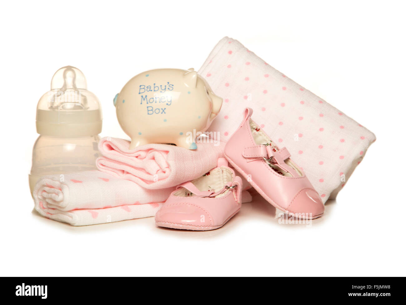 Saving for a baby girl studio cutout Stock Photo