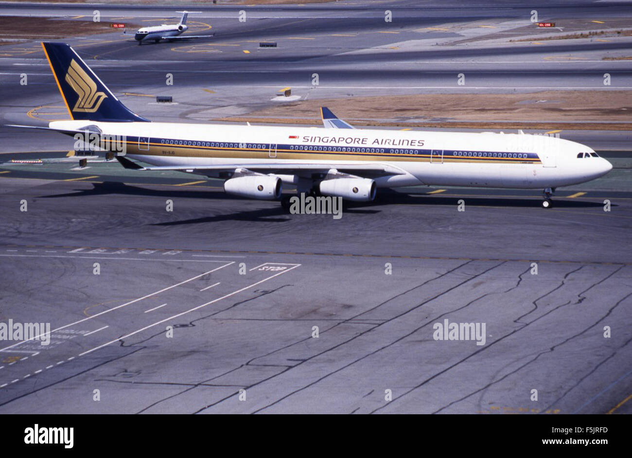 The Airbus A340-313X with the registration number 9V-SJD was