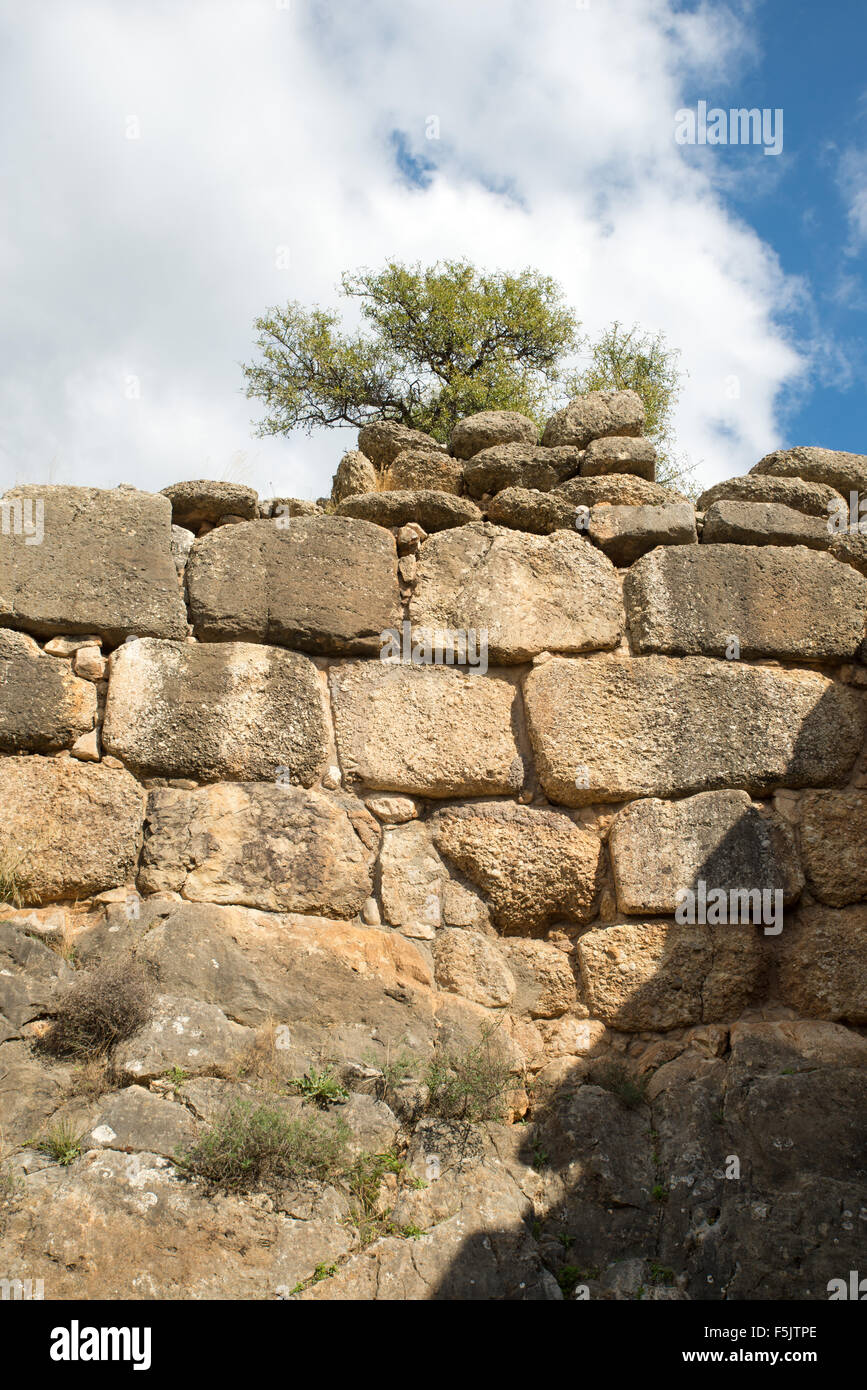 Typical cyclopean masonry wall in the archaeological site of Mycenae Greece. The archaeological sites of Mycenae and Tiryns have Stock Photo