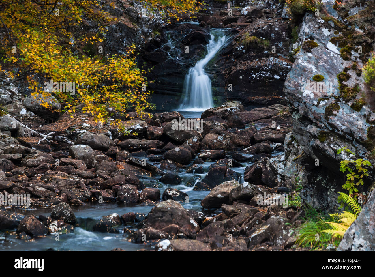 A close up of a small waterfall on a highland burn, Glen Cassley, Sutherland, Scotland. Stock Photo