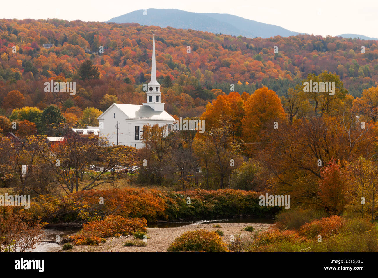 New England autumn; Stowe Vermont Community Church in autumn, Stowe, Vermont New England USA Stock Photo