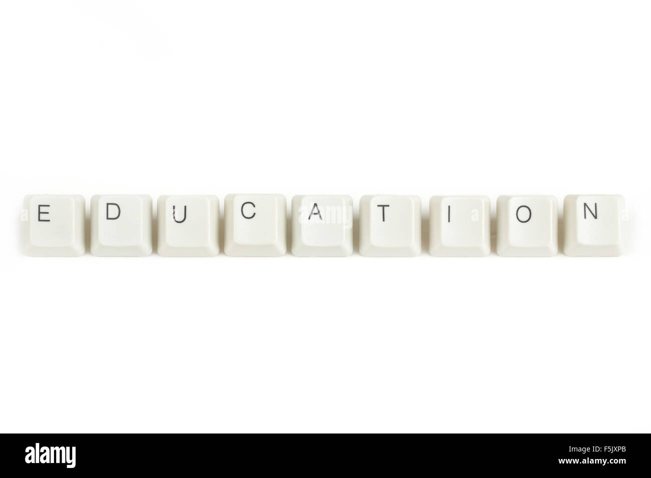 education text from scattered keyboard keys isolated on white ...
