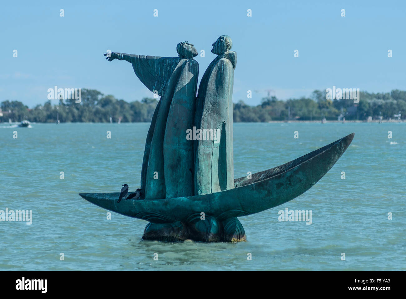 Bronze monument to Dante, 2007, standing in boat, Vergil pointing towards cemetery island San Michele, Russian sculptor George Stock Photo
