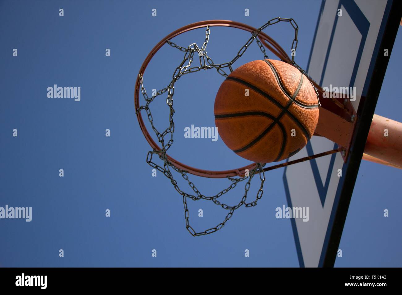 ball falling basketball hoop Stock Photo Alamy