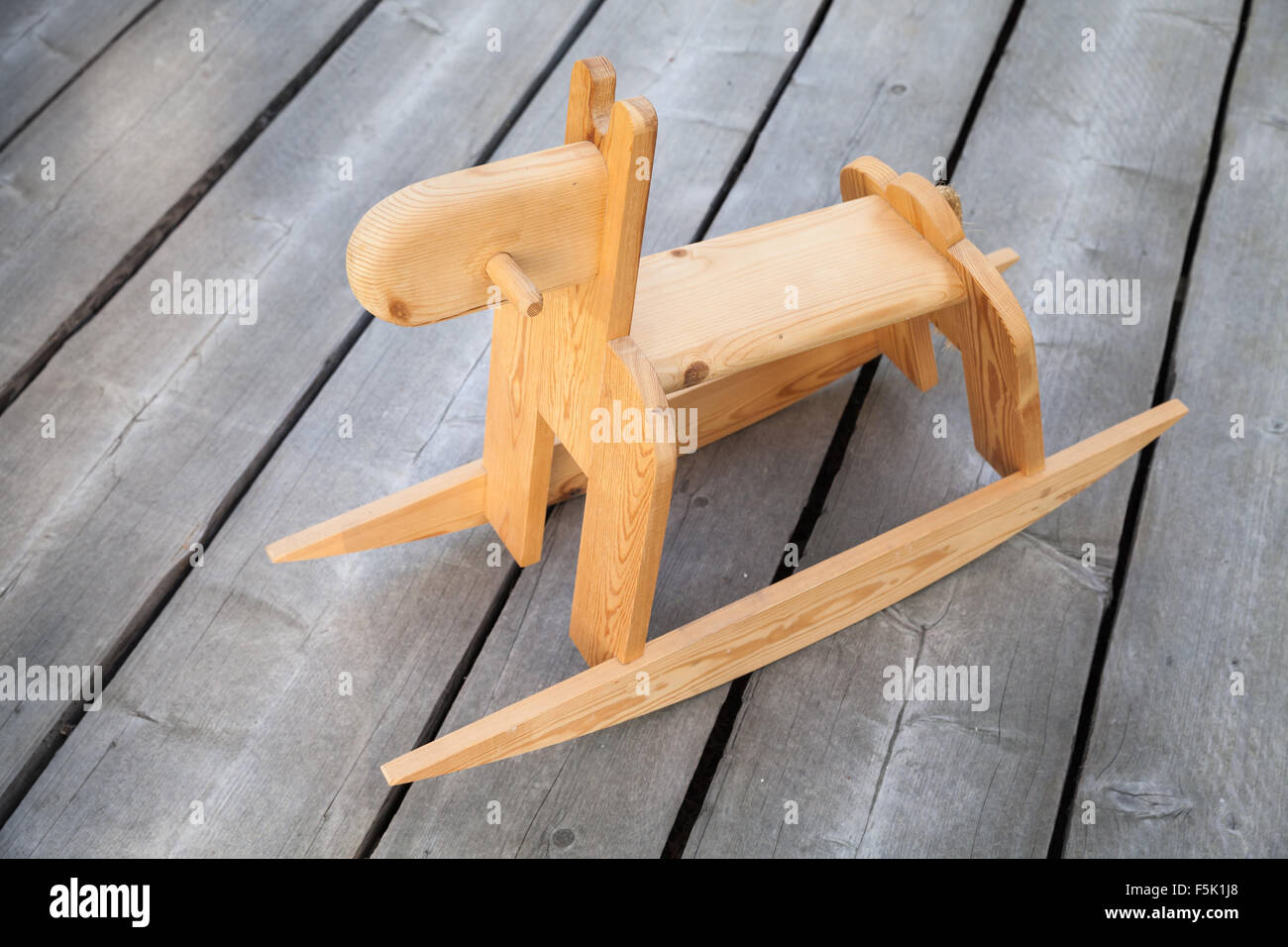Traditional Scandinavian wooden rocking horse toy Stock Photo