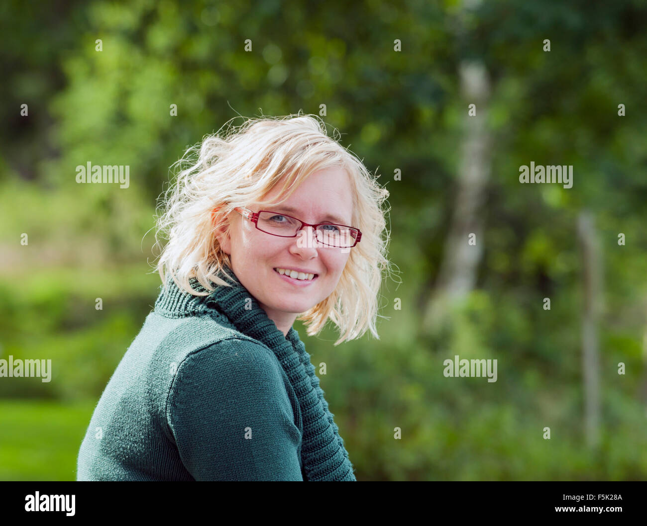 Portrait happy blond woman hi-res stock photography and images - Alamy