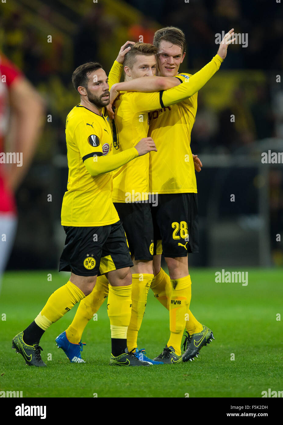 Dortmund, Germany. 5th Nov, 2015. Dortmund's Marco Reus (c) celebrates his goal at 1:0 with teammates Matthias Ginter (r) and Gonzalo Castro (l) during the Europa League group C football match between Borussia Dortmund and FK Qabala at the Signal Iduna Park in Dortmund, Germany, 5 November 2015. PHOTO: GUIDO KIRCHNER/DPA/Alamy Live News Stock Photo