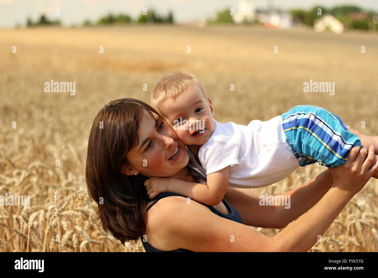 Beautiful mother son in arms hi-res stock photography and images - Alamy