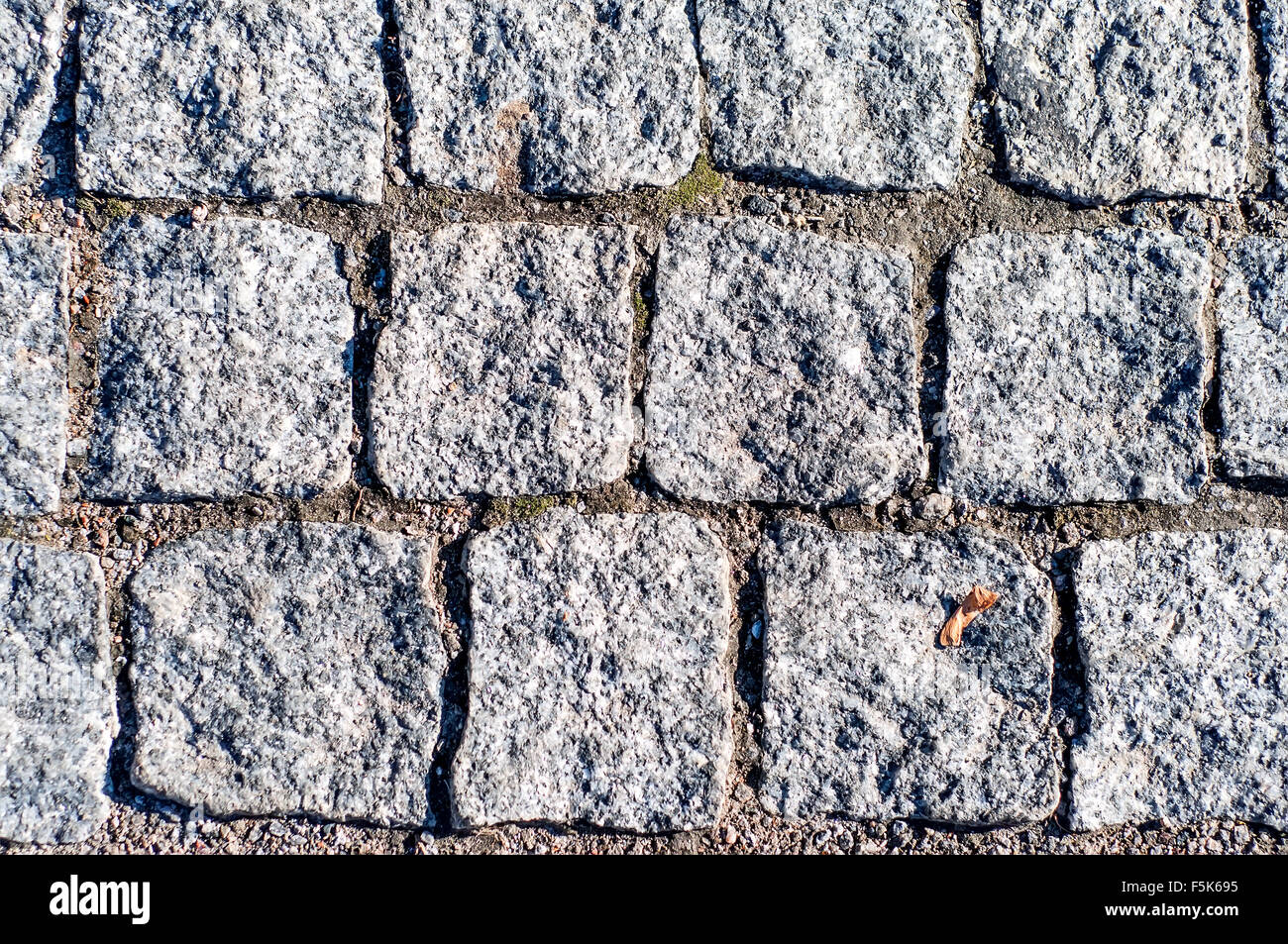 Close up of abstract background texture of paving stone Stock Photo