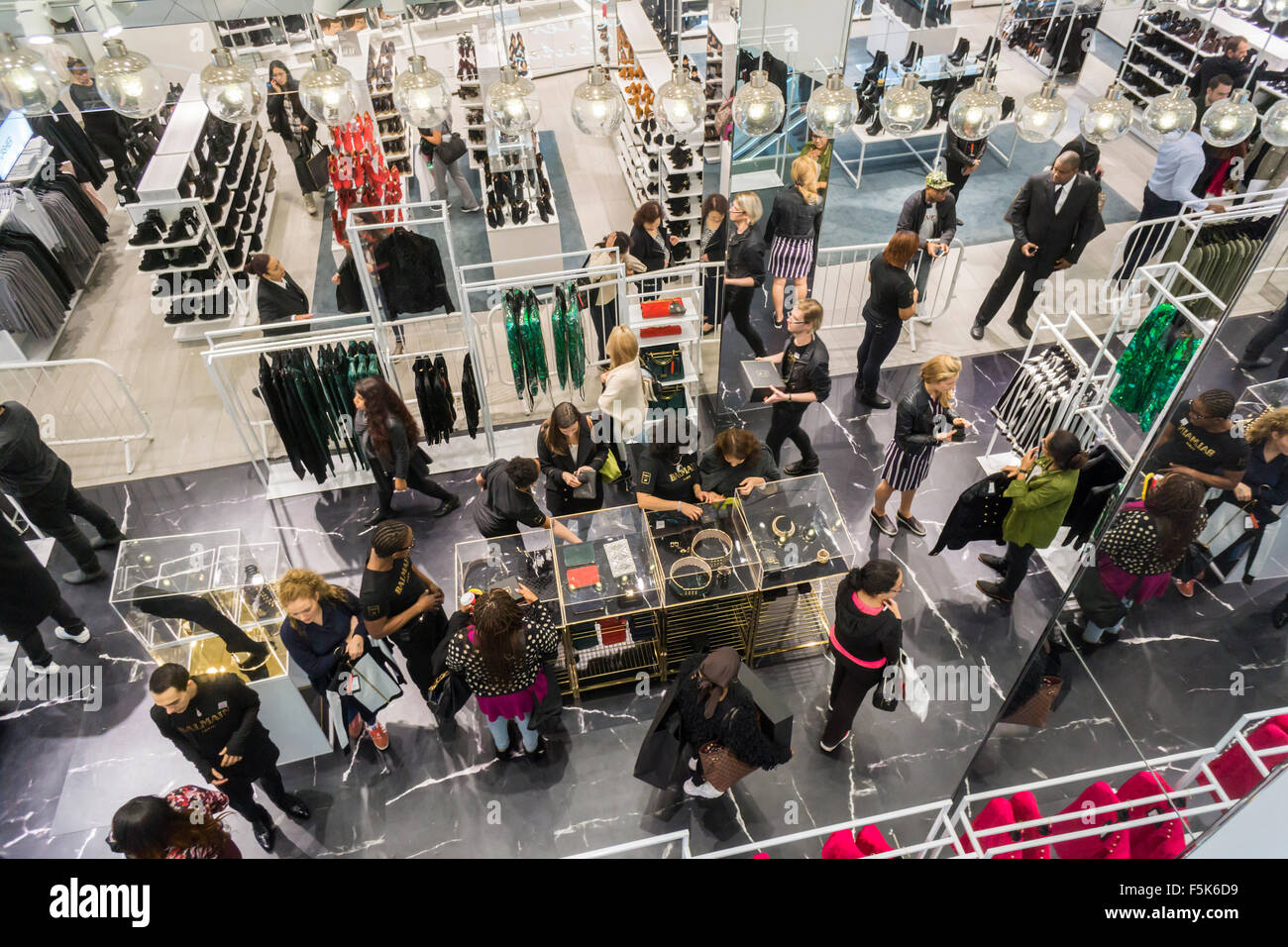 New York, USA. 05th Nov, 2015. Shoppers in the designated Balmain x H&M section of an H&M store in New York on Thursday, November 5, 2015. The collection, designed by the young head of Balmain, Olivier Rousteing, was highly anticipated by fashionistas and drew crowds around the world. In New York H&M instituted a wristband system to time when shoppers could arrive to control crowds. Credit:  Richard Levine/Alamy Live News Stock Photo