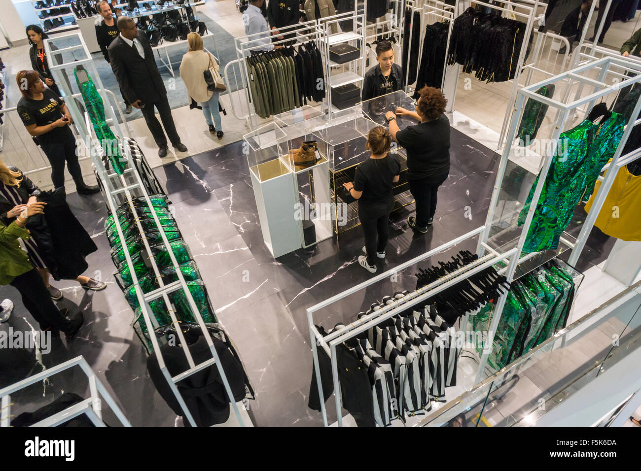 New York, USA. 05th Nov, 2015. Shoppers in the designated Balmain x H&M section of an H&M store in New York on Thursday, November 5, 2015. The collection, designed by the young head of Balmain, Olivier Rousteing, was highly anticipated by fashionistas and drew crowds around the world. In New York H&M instituted a wristband system to time when shoppers could arrive to control crowds. Credit:  Richard Levine/Alamy Live News Stock Photo