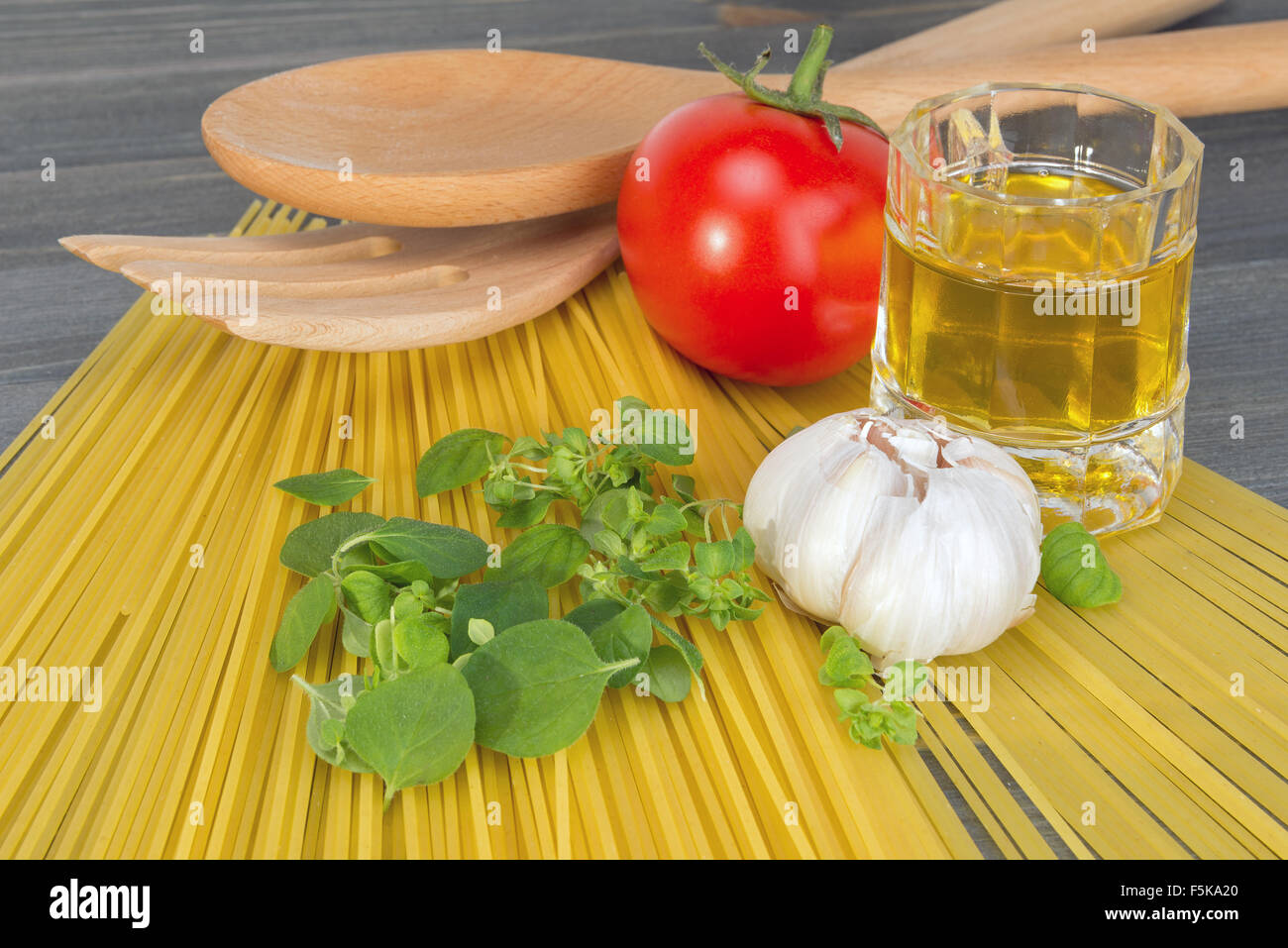 basic ingredients for cooking spaghetti on a wooden table Stock Photo