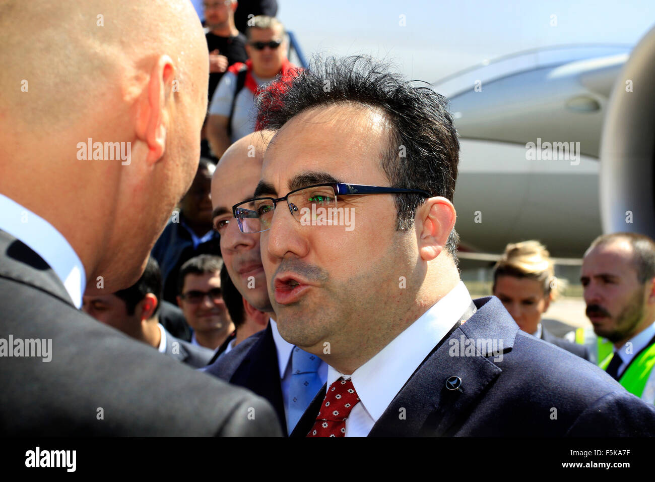 Durban. 5th November, 2015. Ilker Ayci (right)), chairman of Turkish Airlines speaks to Kaan Esener, Turkey's ambassador to South Africa, after arriving aboard the first Turkish Airlines Airbus A330-300 to arrive at Durban's King Shaka International Airport. It was the inaugural flight of its newly launched service between Durban and Istanbul, which will see the airline operate four times a week between Durban and Istanbul via Johannesburg. Credit:  Giordano Stolley/Alamy Live News Stock Photo