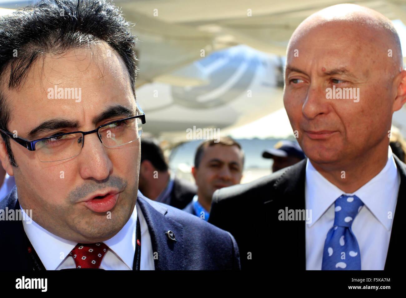 Durban. 5th November, 2015. Ilker Ayci (left), chairman of Turkish Airlines speaks to the media after arriving aboard the first Turkish Airlines Airbus A330-300 to arrive at Durban's King Shaka International Airport. It was the inaugural flight of its newly launched service between Durban and Istanbul, which will see the airline operate four times a week between Durban and Istanbul via Johannesburg. To the right of AycÄ± is Turkey's ambassador to South Africa, Kaan Esener. Credit:  Giordano Stolley/Alamy Live News Stock Photo