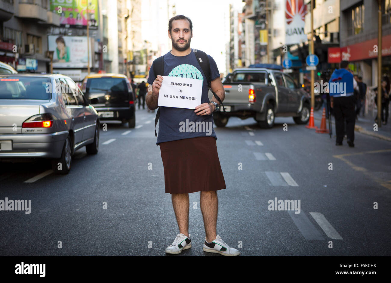 Buenos Aires, Argentina. 5th Nov, 2015. A demonstrator wearing a skirt participates in a march against gender violence in Buenos Aires, Argentina, on Nov. 5, 2015. Men wearing skirts taook part in a march against gender violence organized by social networks with the slogan 'Wear the skirt if you are a male' . Credit:  Martin Zabala/Xinhua/Alamy Live News Stock Photo