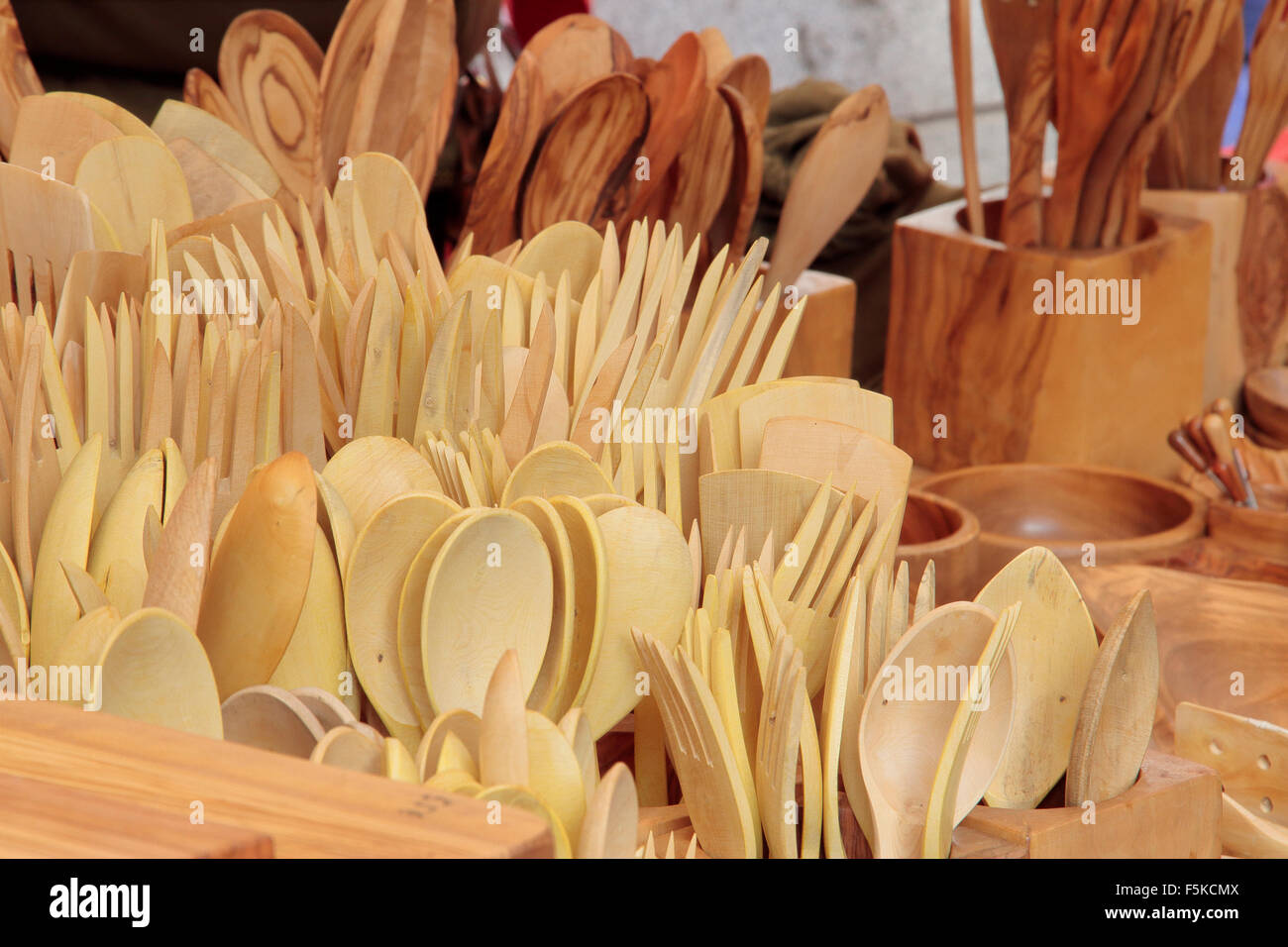 forefront of several cookware carved in olive wood Stock Photo Alamy
