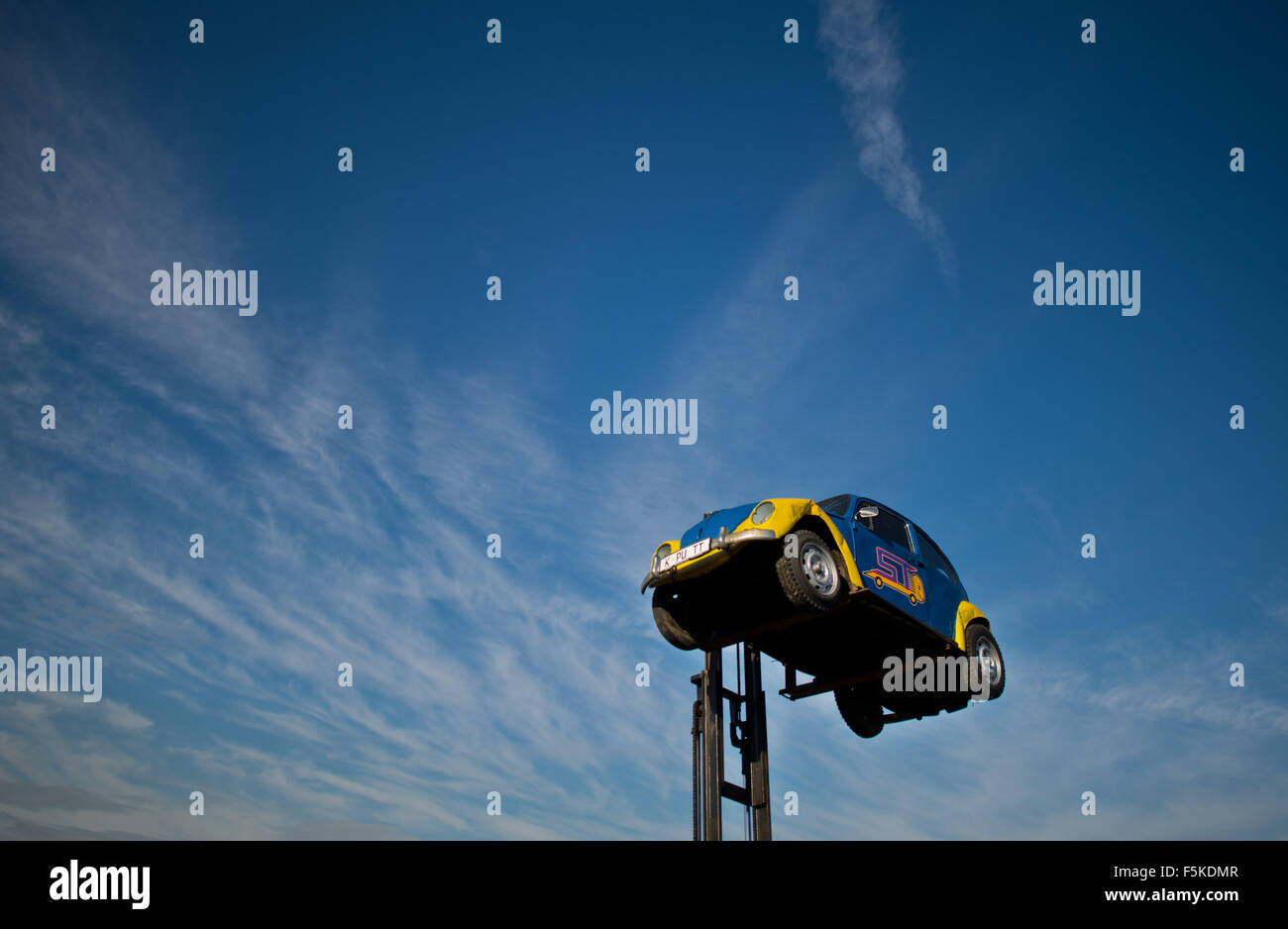 Peine, Germany. 05th Nov, 2015. An old Volkswagen Beetle with the license plate 'K-PU TT' (kaputt - broken) can be seen on a forklift at a junk yard in Peine, Germany, 05 November 2015. Photo: JULIAN STRATENSCHULTE/dpa/Alamy Live News Stock Photo