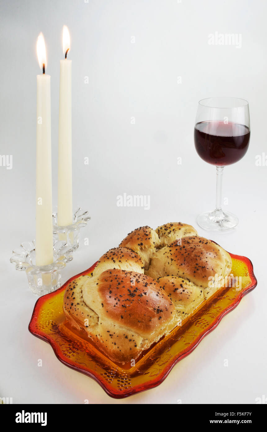 Shabbat Observance, Challah, Wine, Lit Candles Stock Photo