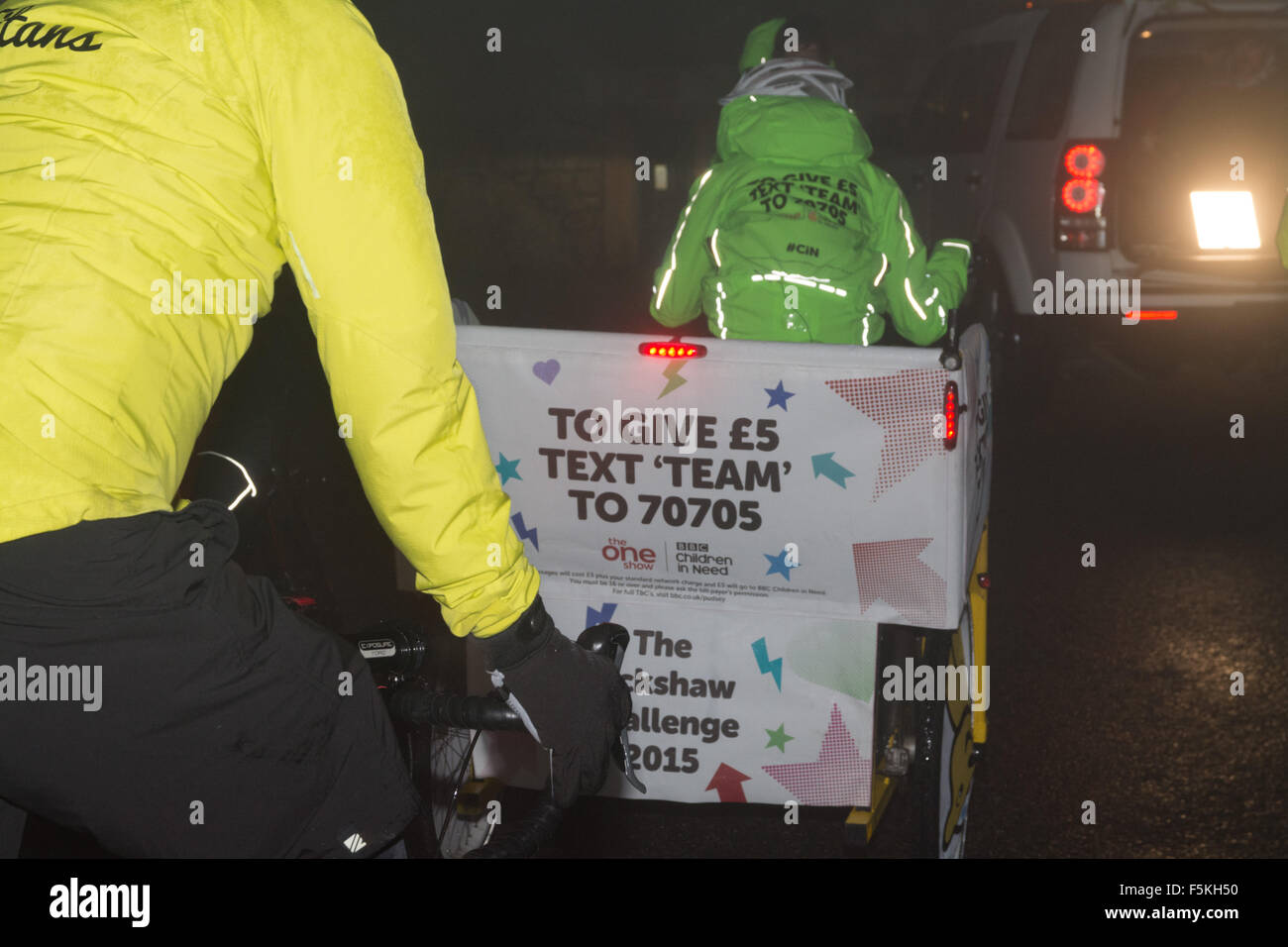 Lands End, Cornwall, UK. 6th November 2015.  At 5 am on a wet and foggy morning,  BBC presenter Matt Baker and six young riders set off on their 470 mile journey from Land's End to the East End to help fundraise for BBC children in need. Credit:  Simon Maycock/Alamy Live News Stock Photo