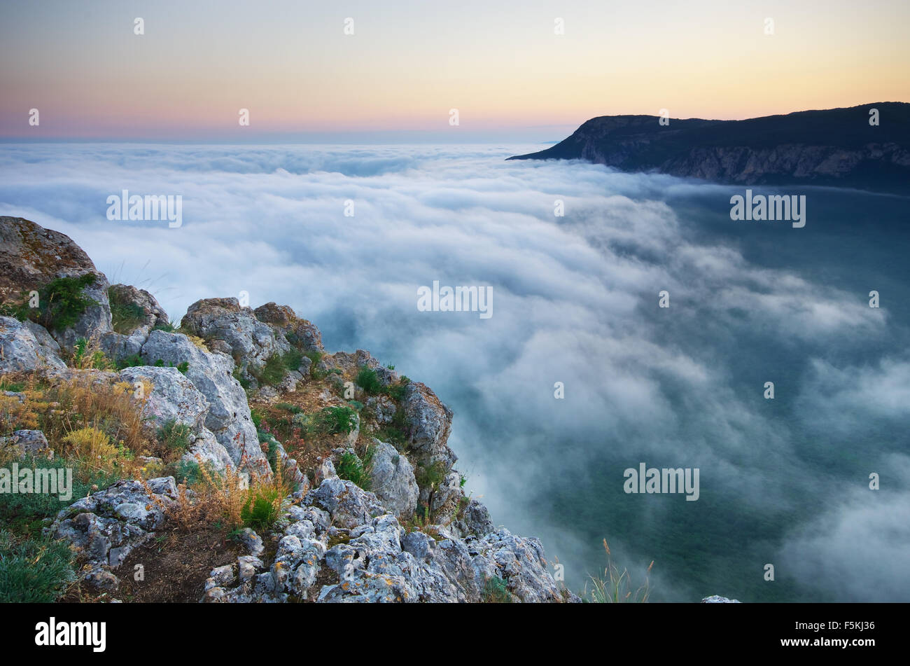 Fog above green mountain hi-res stock photography and images - Alamy