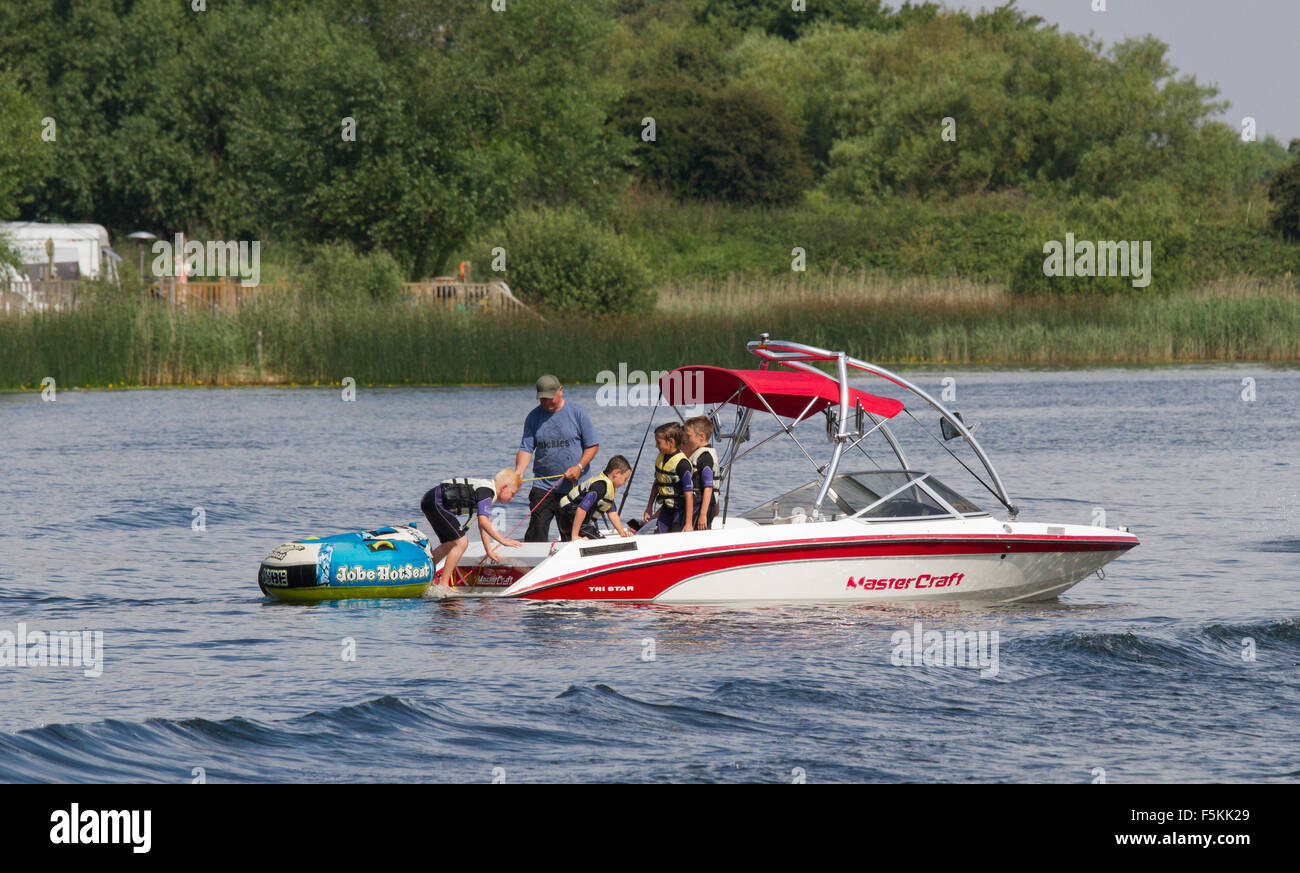 Children messing about on the river lake in ringos Stock Photo Alamy