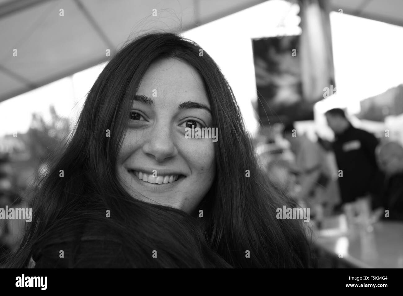 Greek woman with a happy expression in black and white Stock Photo