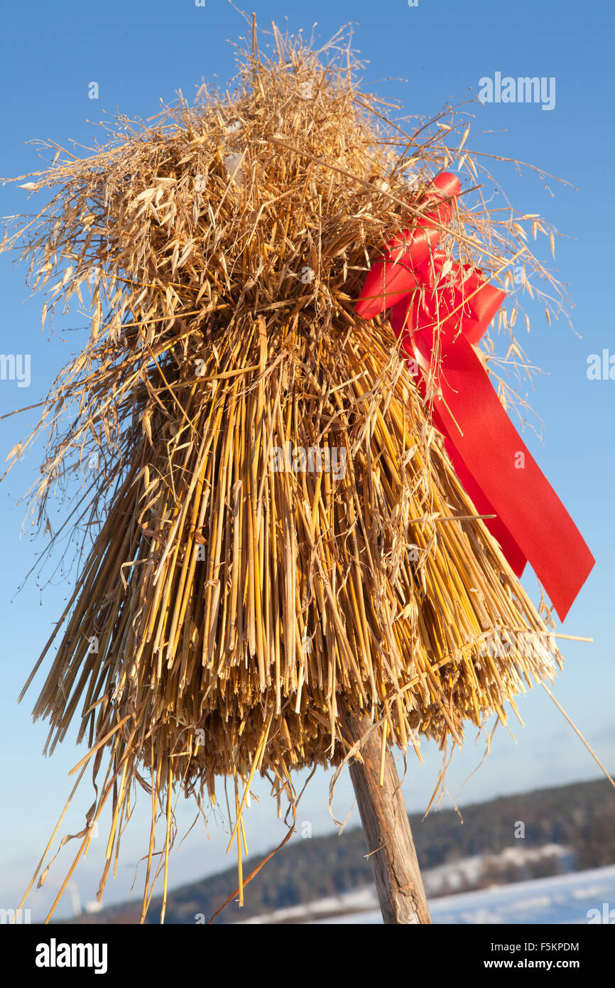 Sweden, Uppland, Steninge, Hay stack with tied bow Stock Photo