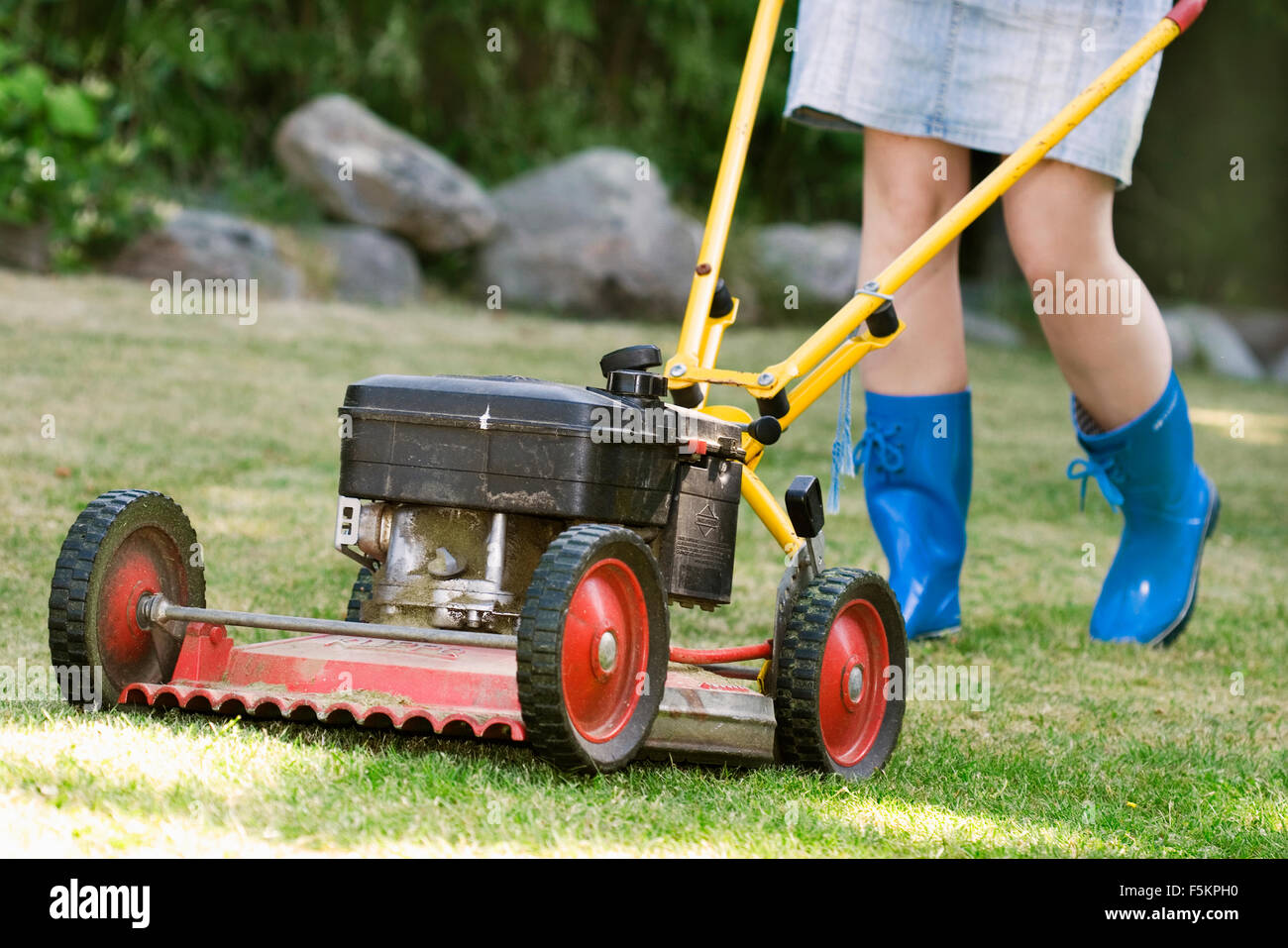 Woman Mowing Lawn High Resolution Stock Photography and Images - Alamy