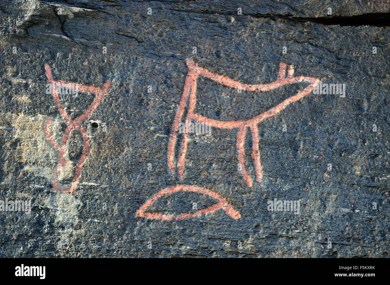 old rock carvings (petroglyphs) ranging from 2000 to 4500 BC Stock Photo