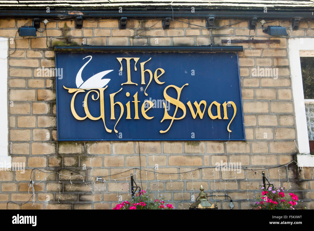 The White Swan Pub welcome sign in central Hebden Bridge, Calderdale, West Yorkshire, England, United Kingdom. Stock Photo