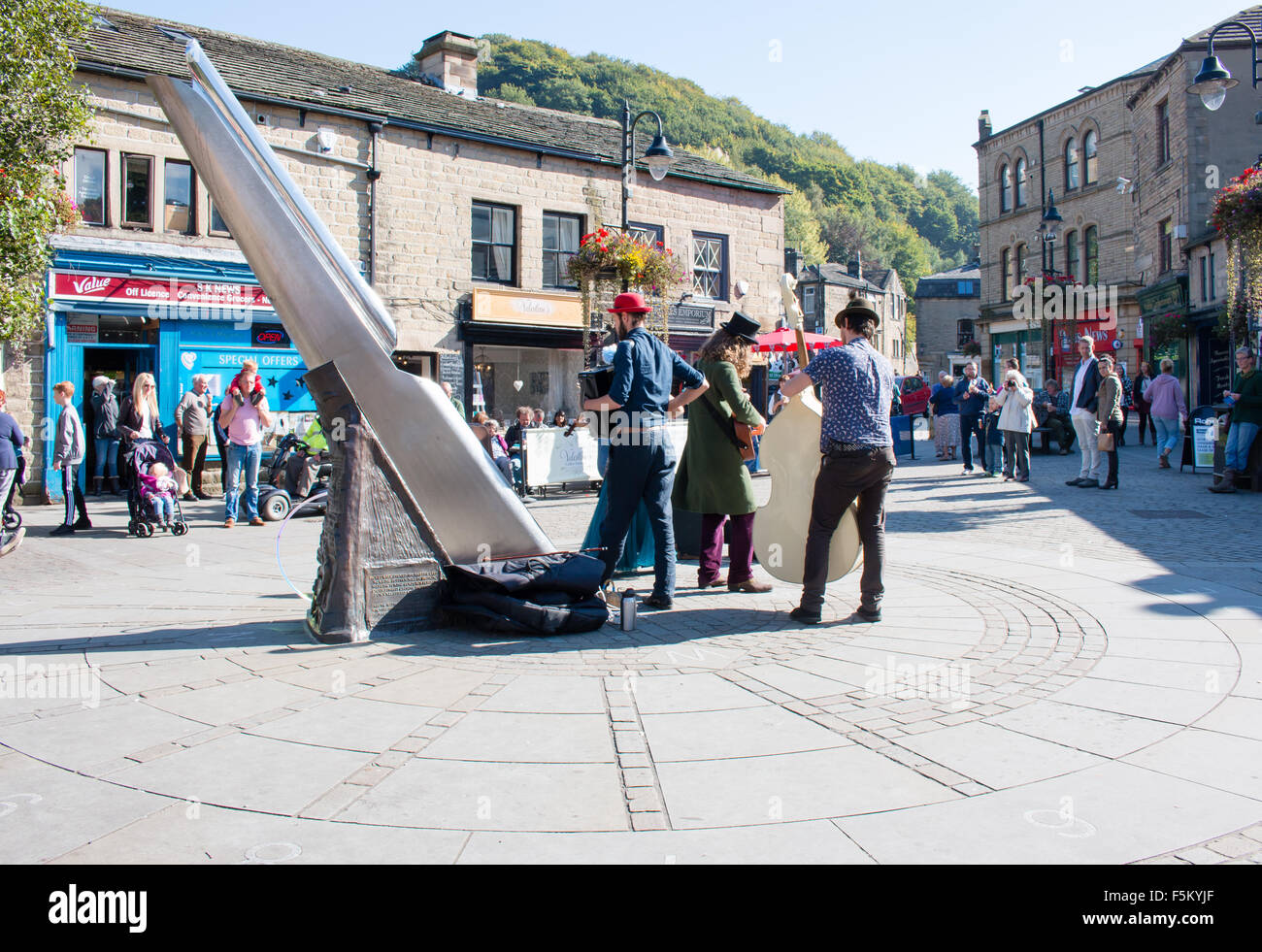 Street Performers at central Hebden Bridge, Calderdale, West Yorkshire, United Kingdom. Sunny day. Stock Photo