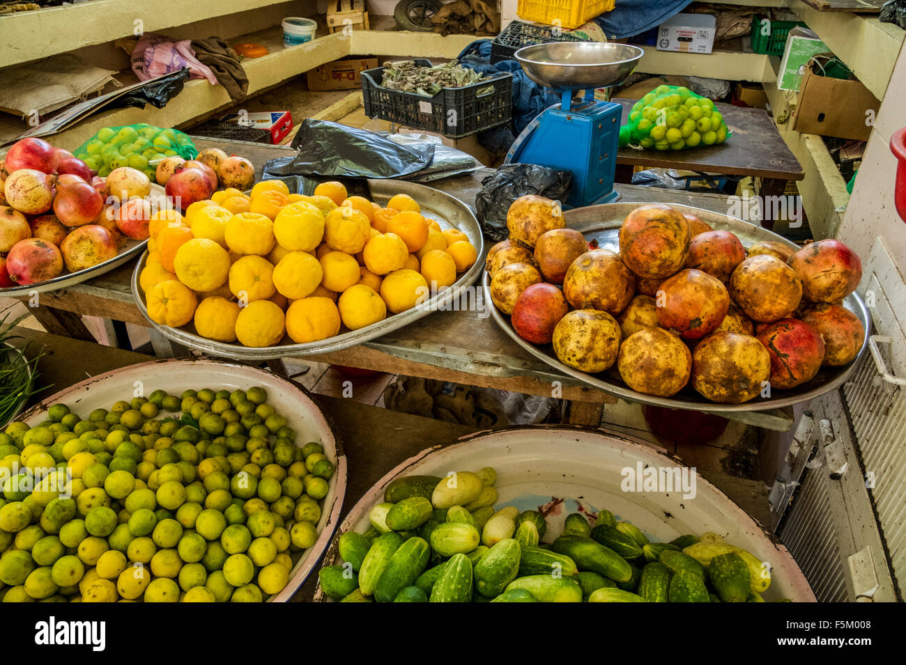 The Oman, fresh fruits of pomegranate, limes and oranges in the market