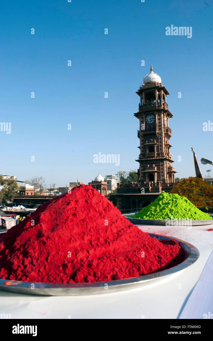 Dry colour in plate holi festival, clock tower, jodhpur, rajasthan, india, asia Stock Photo