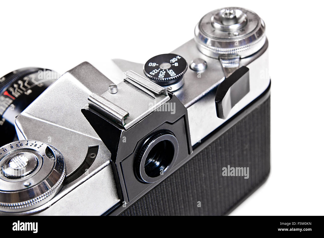 Range finder camera with lens. Close up view part of old retro photo camera. Back view of classic black manual film camera isola Stock Photo