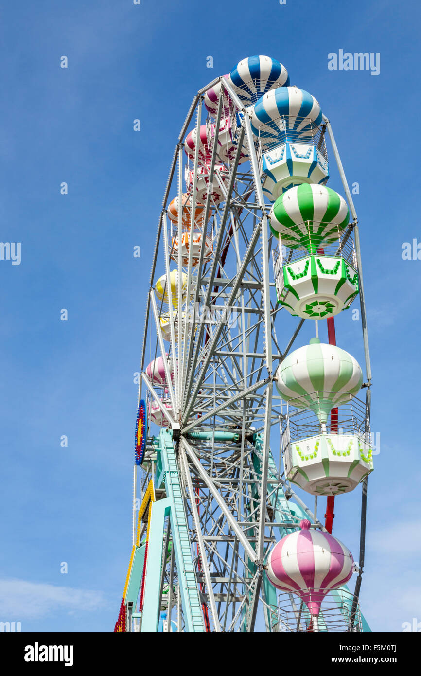 A big wheel against a blue sky. The Giant Wheel at Skegness, Lincolnshire, England, UK Stock Photo