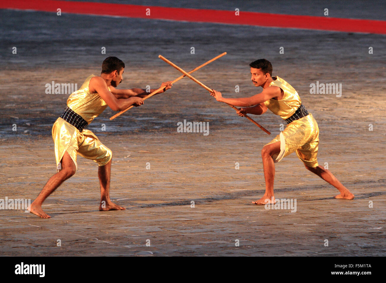 Self defence with stick demonstration at gateway, mumbai, maharashtra, india, asia Stock Photo