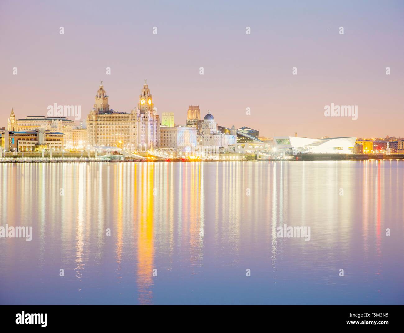 Liver building and River Mersey at dusk, Liverpool, England, UK Stock Photo
