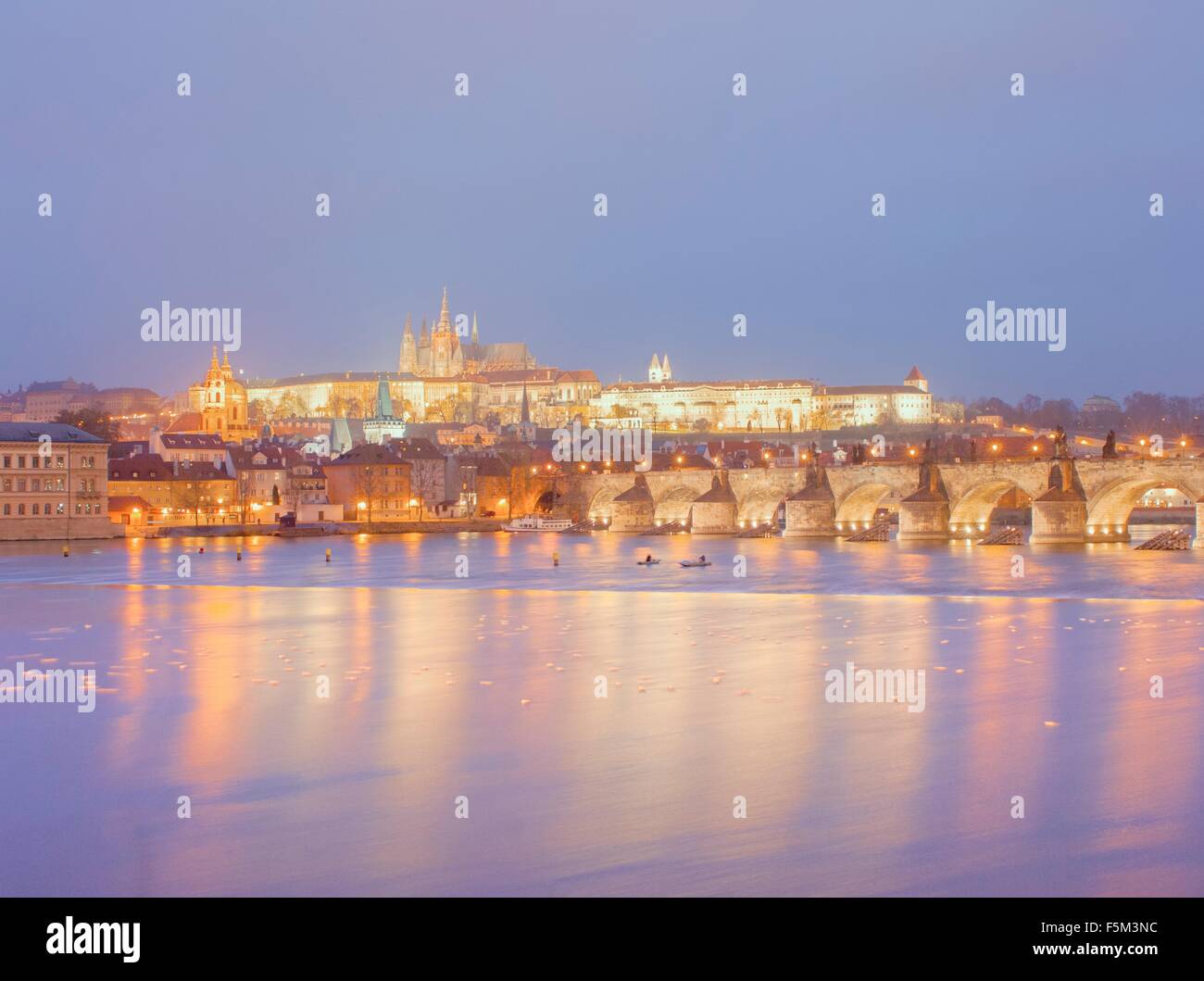 View of St Vitus Cathedral and Charles Bridge at dusk, Prague, Czech Republic Stock Photo