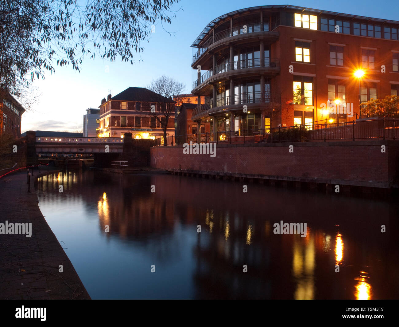 Dusk blue hour by the canal waterfront in Nottingham City, Nottinghamshire England UK Stock Photo