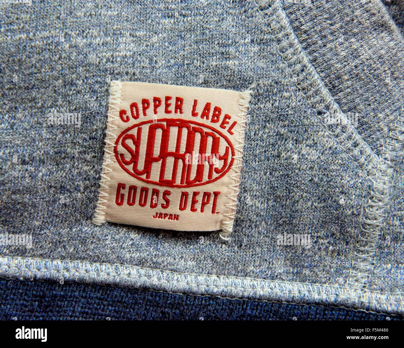 Superdry clothing label logos Stock Photo - Alamy