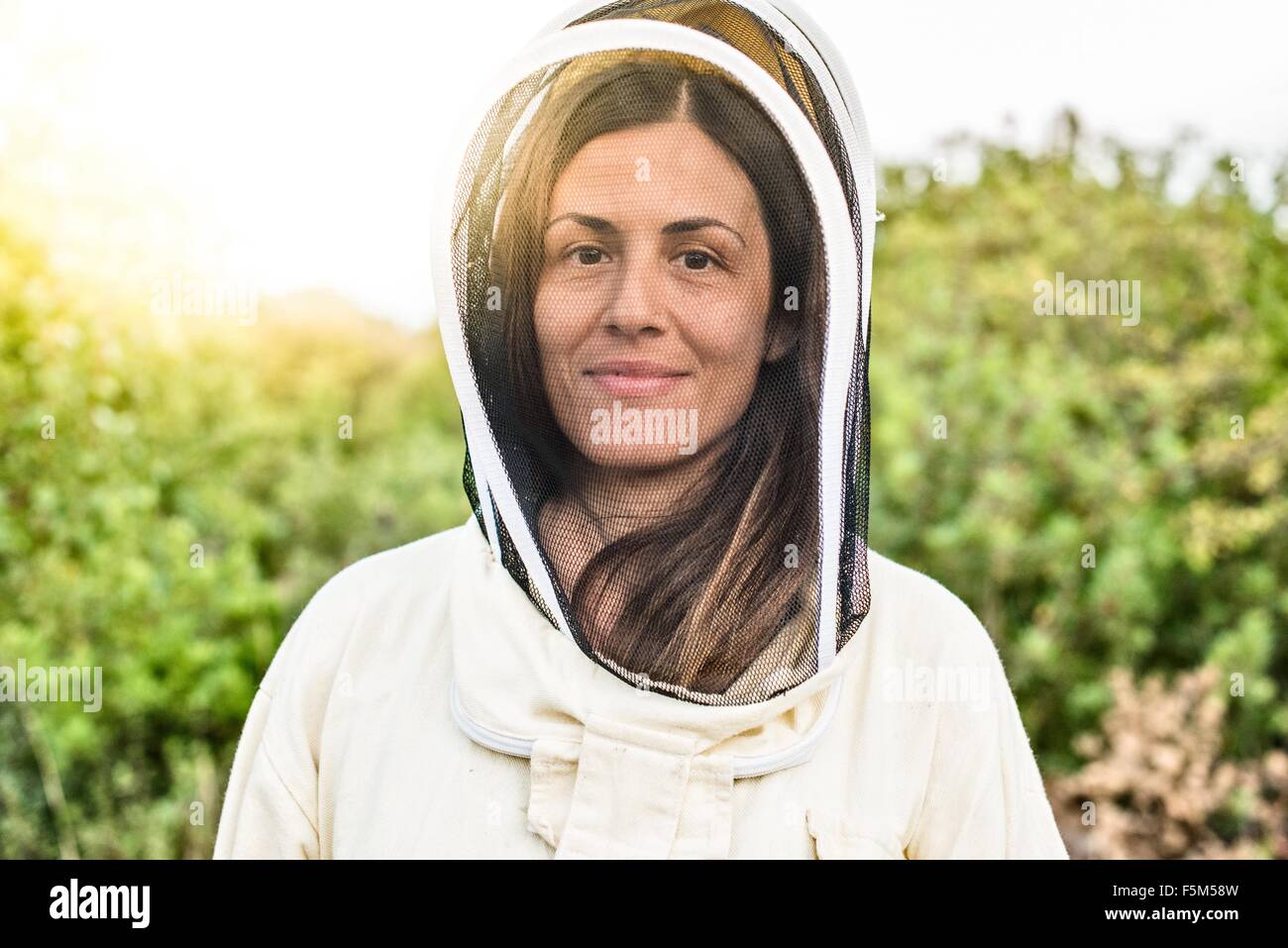 Portrait of female beekeeper Stock Photo