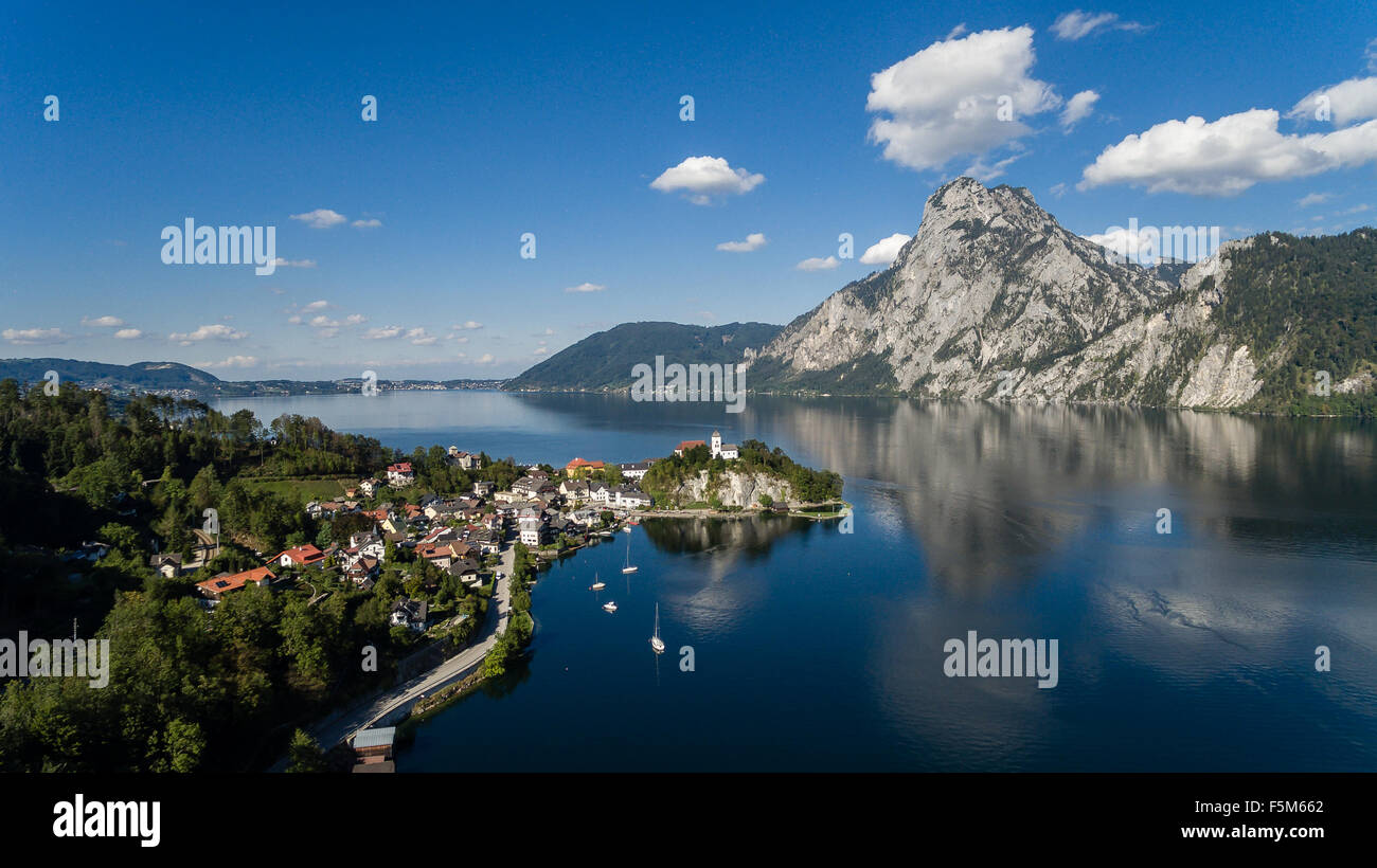 Traunsee summer lake panorama with sunshine in sky Gmunden, Austria, aerial view Stock Photo