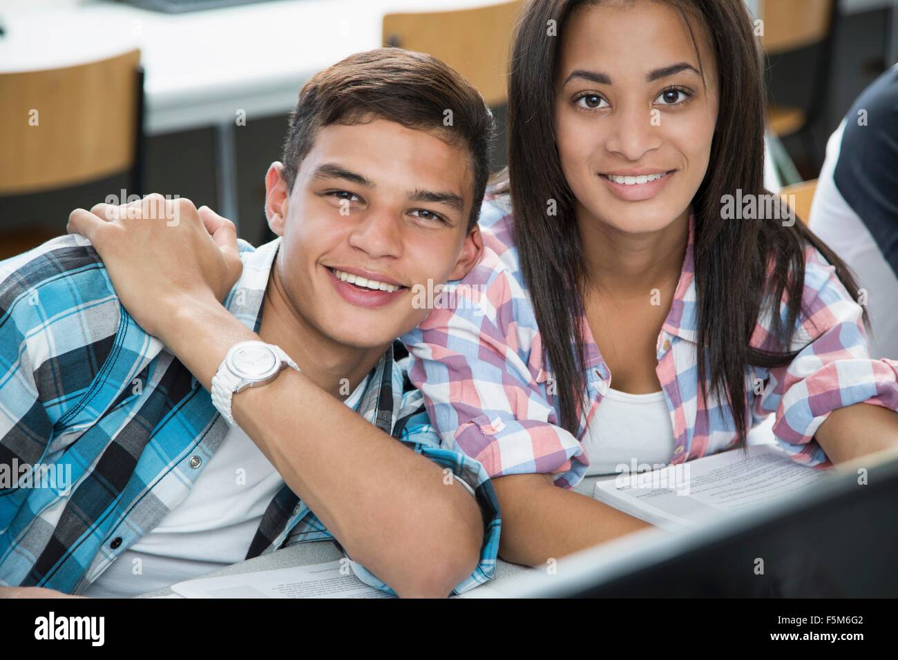 Portrait of teenage boy and girl in high school computer class Stock Photo Alamy